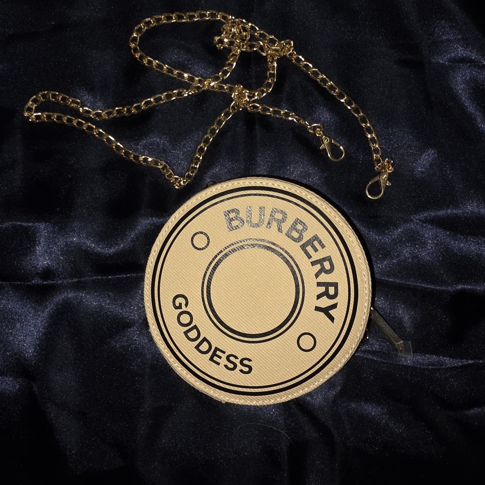 Burberry Tan And Black Round Crossbody Purse. Comes With Non-branded Gold Chain.